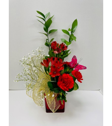 Colour Splash Flower Arrangement - Red - Standard. An arrangement by Balloon Bouquets Plus.