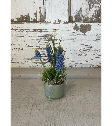 Faux Lavender Plant in Green Pot. An arrangement by Metcalfe Florist and Pleasant View Greenhouses.