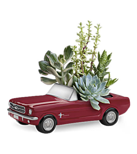 Teleflora's Dream Wheels '65 Ford Mustang. An arrangement by Anderson Flowers.