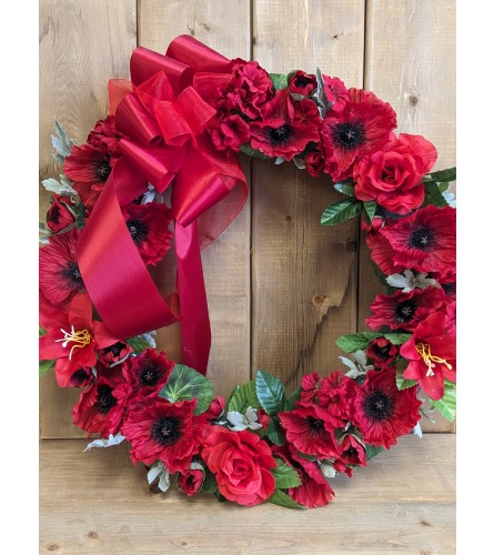 Lest we Forget. An arrangement by Mayfield Flowers.
