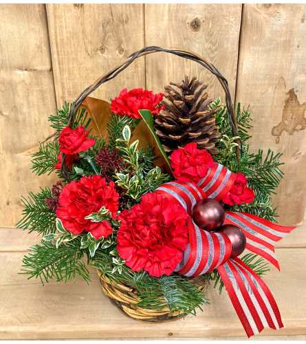 Cozy Christmas Basket. An arrangement by Mayfield Flowers.
