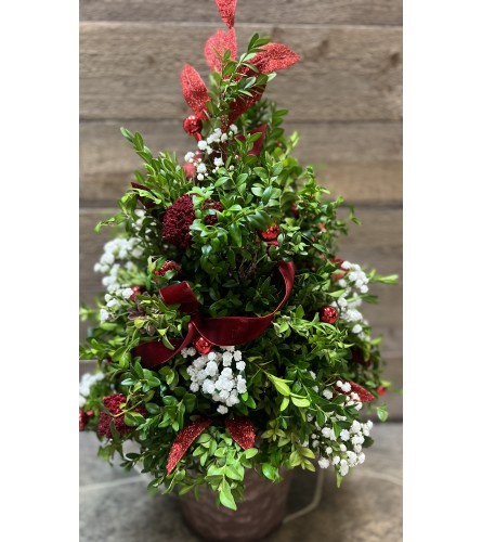 Table Topper Ruby Red - Deluxe. An arrangement by Donato's Floral.