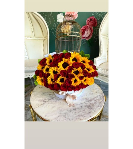 SUNFLOWER AND RED ROSES BOX - Standard. An arrangement by BellaRosa Gardens.