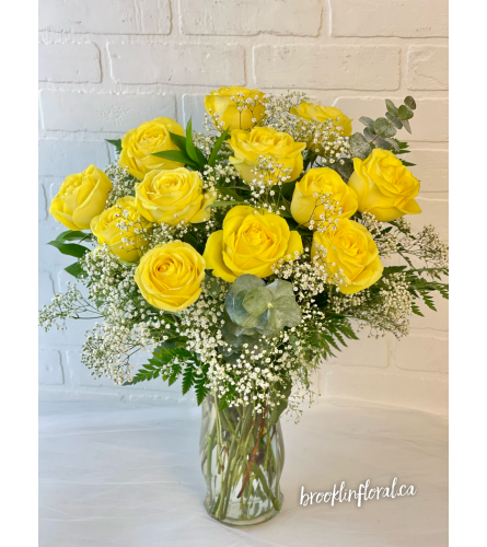 Yellow Dozen Roses In A Vase