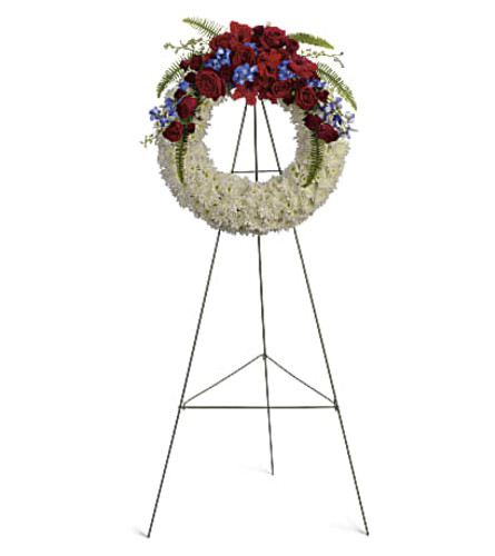 Reflections of Glory Wreath Spray - Deluxe. An arrangement by Love Story Florist.