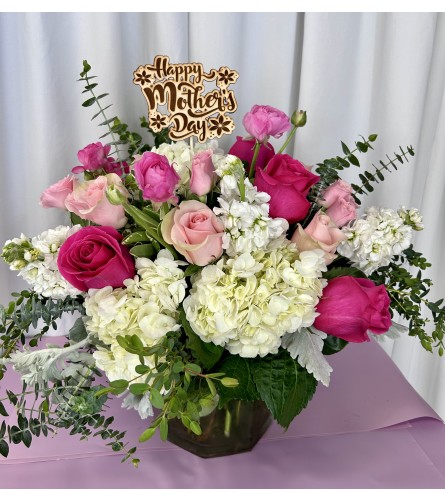 SHADES OF PINK 24. An arrangement by M's Flowers.