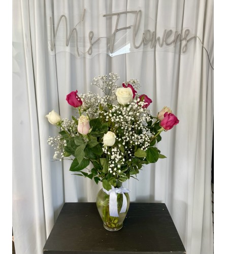 MOTHERS ROSES 24. An arrangement by M's Flowers.