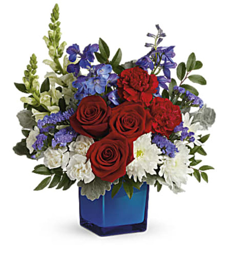 Teleflora's Red, White, and Blooms. An arrangement by Love Floral.