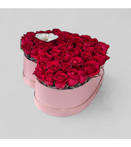 Red Heart Box - Deluxe. An arrangement by Charming Blooms.