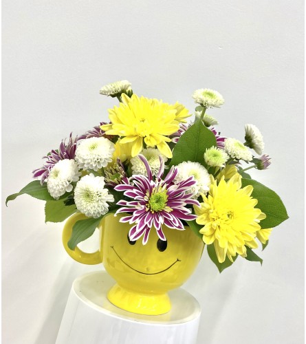 Good mood. An arrangement by Flowers and Beyond.