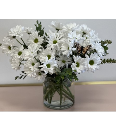 Sunny Days. An arrangement by Mae's Flowers and Gifts.