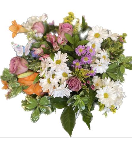 Enchanted Butterfly Garden Basket. An arrangement by A Touch of Elegance Florist and Events LLC.