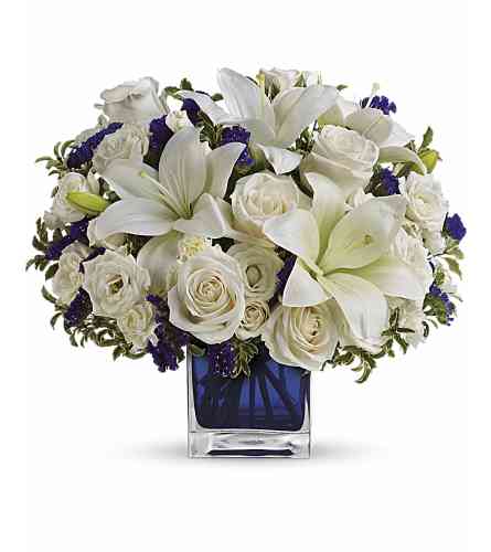 Cheers to the heart. - Deluxe. An arrangement by Flowers and Beyond.