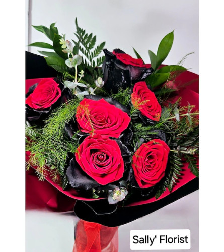 Sally's Black Velvet 6 Roses Bouquet - Deluxe. An arrangement by Triple A Florist.