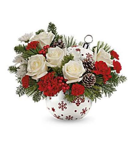 Teleflora's Snowy Sparkle arrangement in ornament - Deluxe. An arrangement by Nicol Florist.