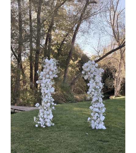 Faux Floral Arch Rental - Deluxe. An arrangement by Anderson Flowers.