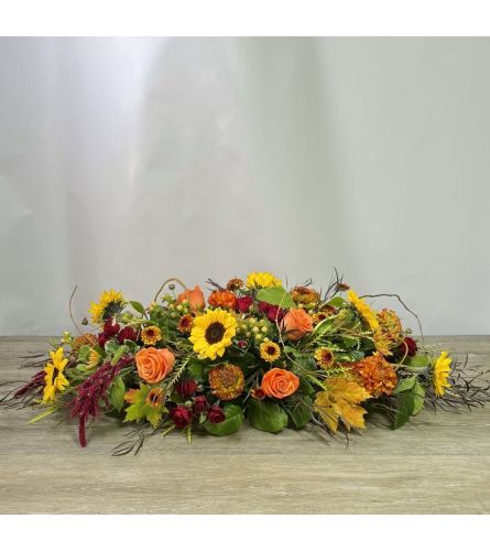 Thanksgiving Harvest. An arrangement by New Britain Flower Shop.