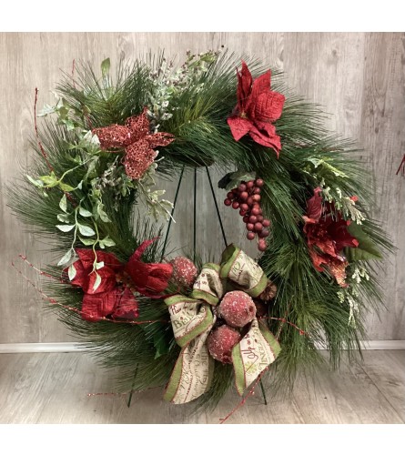 Happy Home Artificial Xmas Wreath. An arrangement by Roma Flowers and Gifts.