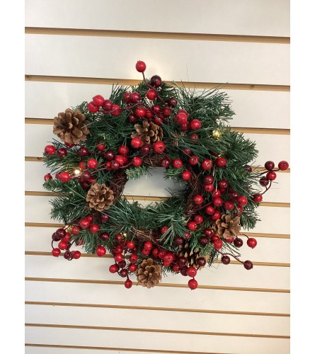 Cranberry Christmas Mini-Wreath Artifical. An arrangement by Roma Flowers and Gifts.
