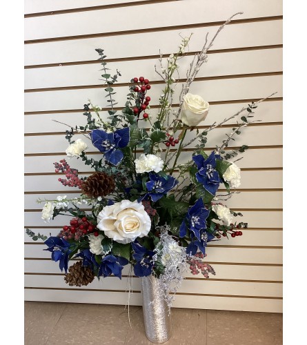 Large Blue and Silver Christmas Arrangement Artificial. An arrangement by Roma Flowers and Gifts.