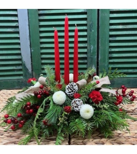 Winter Warmth Centerpiece. An arrangement by Forest Florist.