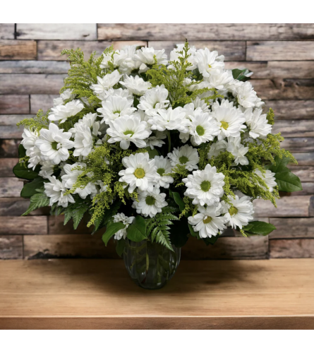 Daisy Love. An arrangement by Brooklin Floral and Garden Shoppe Inc..