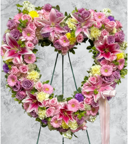 Marivel's Blossoming Heart. An arrangement by Marivel's Florist and Gifts.