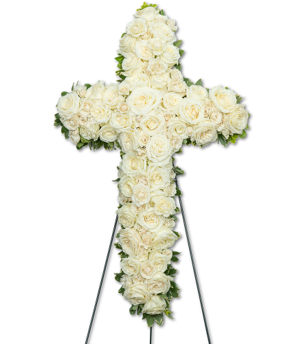 Pure Serenity Cross Sympathy. An arrangement by The Flower Shop of Lake Charles.