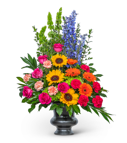 Forever Blooming Bright Urn. An arrangement by The Flower Shop of Lake Charles.