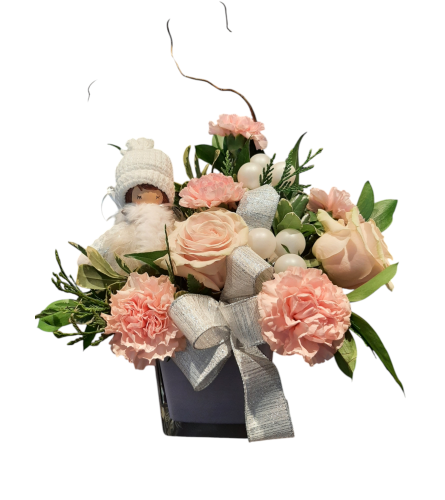 Winters' Little Darling - Deluxe. An arrangement by Avenue Florist.