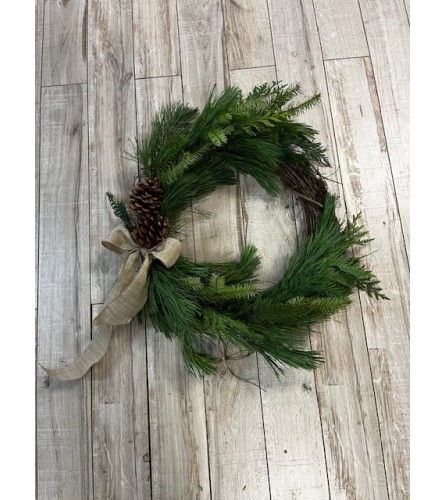 Holiday Classic Wreath. An arrangement by Floral Classics.