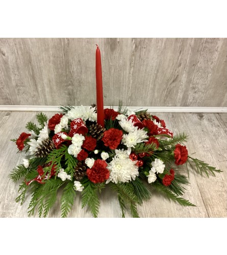 Red and White Winter Delight - Deluxe. An arrangement by Roma Flowers and Gifts.