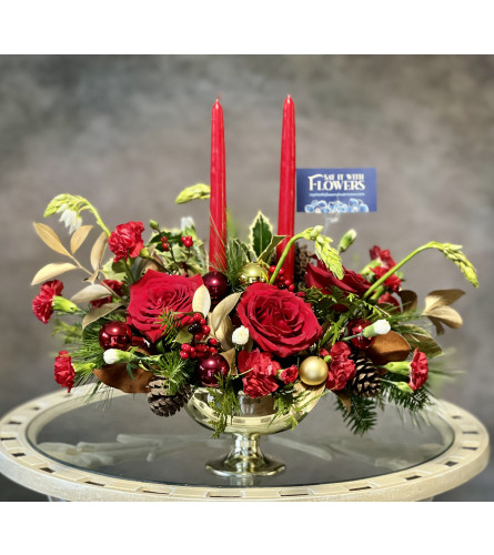 A Holly Jolly Centrepiece - Deluxe. An arrangement by Say It With Flowers.