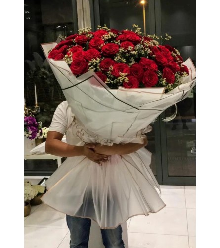 My Queen Giant Boutique. An arrangement by Flowers by Connie.