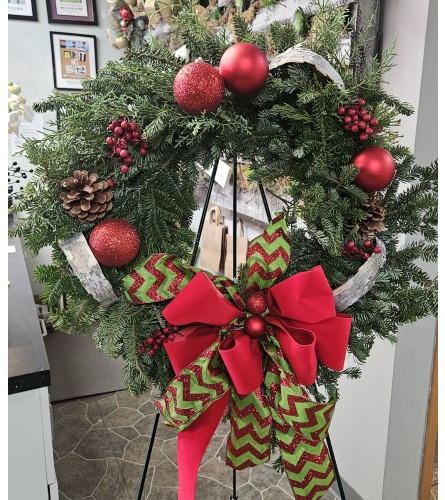 Fresh Holiday Wreath - Standard. An arrangement by Donato's Floral.