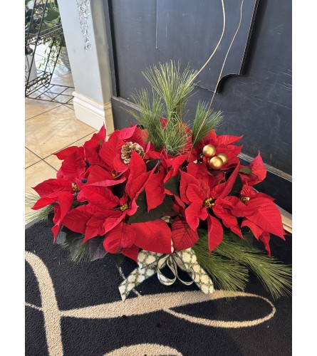 Red Festive Poinsettia - Standard. An arrangement by Loyalist Flowers.
