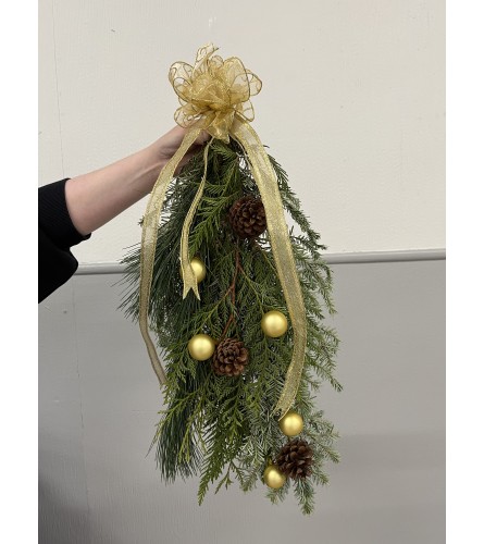 Florist Choice- Holiday Swag. An arrangement by Osborne Florist.