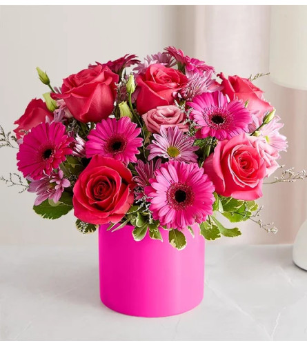 Flirty Fun - Deluxe. An arrangement by Palmetto Gardens Florist.