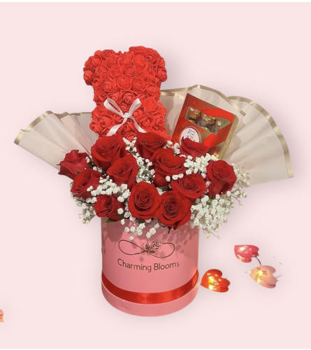 Valentines Special R. An arrangement by Charming Blooms.