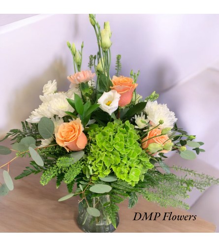 Sunset. An arrangement by DMP Flowers and Gifts.
