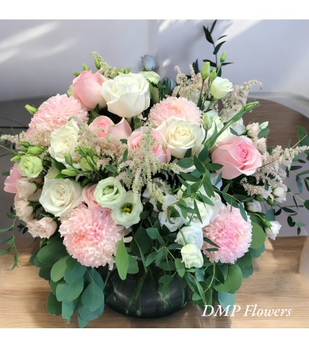 Blushing florals. An arrangement by DMP Flowers and Gifts.