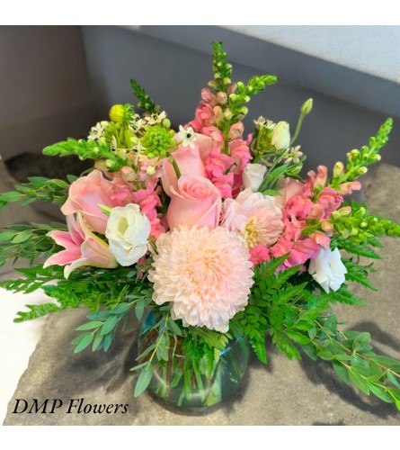 Rosy Blooms. An arrangement by DMP Flowers and Gifts.