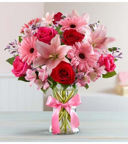 Blushing Petal Symphony. An arrangement by Fink Flowers, Gifts and Flower Delivery.