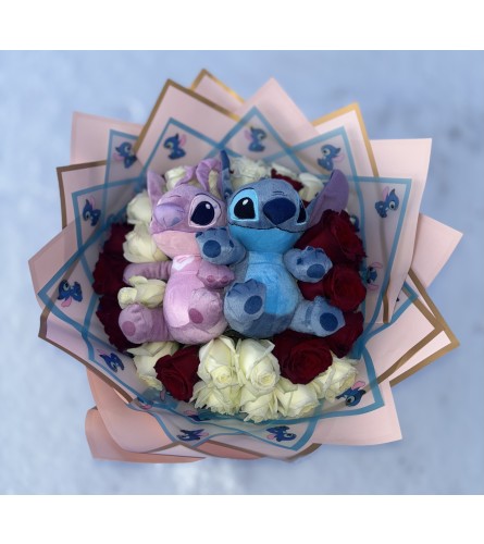 Stitching Love Blooms - Deluxe. An arrangement by Vemongi Flowers.