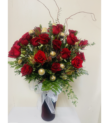 Roses with chocolate. An arrangement by Dream Decorations Florist.