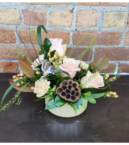 'By Design' Just Peachy - Deluxe. An arrangement by Flowers By Design.