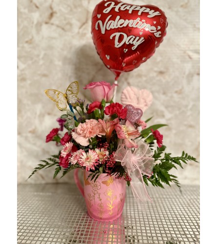 Cup of Love. An arrangement by Kelly Ann's Floral.