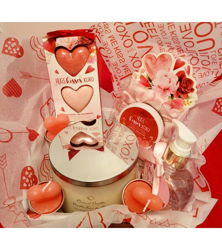 HUGS AND KISSES PINK BASKET. An arrangement by A Loving Touch Florist.