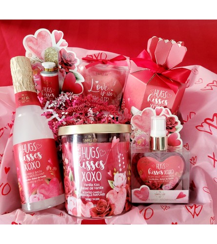 HUGS AND KISSES THE WORKS BASKET. An arrangement by A Loving Touch Florist.