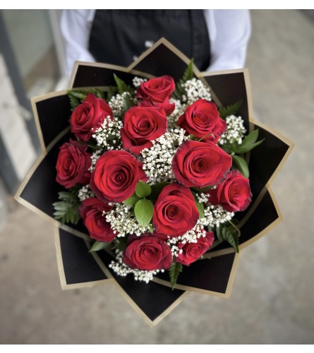 Premium Long-stemmed Red Rose Bouquet - Deluxe. An arrangement by The Flower Shop in the Village.